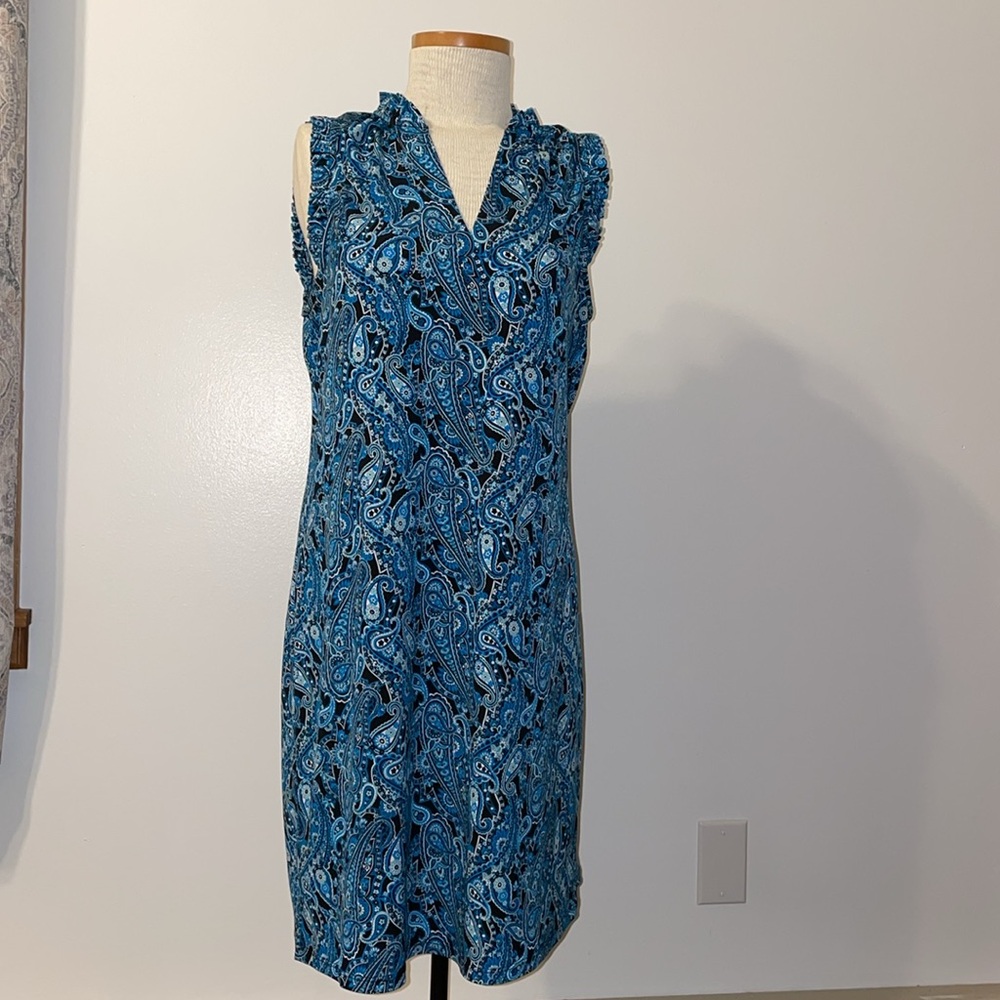 Micheal kors! Like new. No tears or stains. Woman’s medium dress.